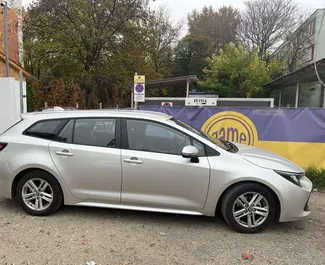 Front view of a rental Toyota Corolla TS in Budapest, Hungary ✓ Car #4750. ✓ Automatic TM ✓ 0 reviews.