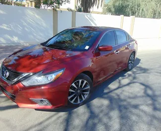 Front view of a rental Nissan Altima in Dubai, UAE ✓ Car #4961. ✓ Automatic TM ✓ 0 reviews.