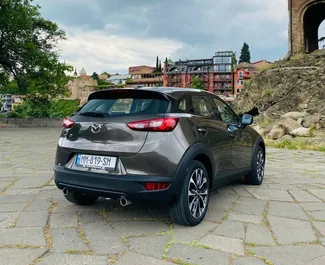 Petrol 1.9L engine of Mazda CX-3 2018 for rental in Tbilisi.