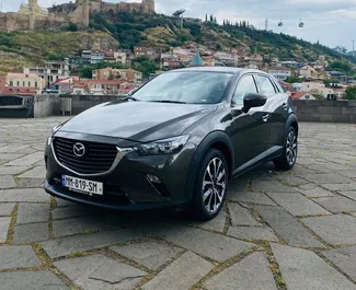 Front view of a rental Mazda CX-3 in Tbilisi, Georgia ✓ Car #4879. ✓ Automatic TM ✓ 0 reviews.