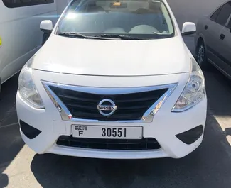 Front view of a rental Nissan Sunny in Dubai, UAE ✓ Car #4956. ✓ Automatic TM ✓ 1 reviews.