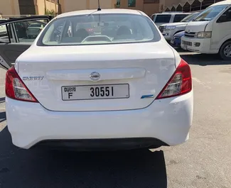 Nissan Sunny 2018 car hire in the UAE, featuring ✓ Petrol fuel and 130 horsepower ➤ Starting from 104 AED per day.
