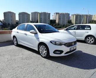 Fiat Egea 2021 car hire in Turkey, featuring ✓ Petrol fuel and 95 horsepower ➤ Starting from 30 USD per day.