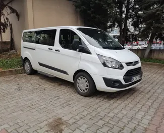 Front view of a rental Ford Tourneo Custom at Istanbul Sabiha Gokcen Airport, Turkey ✓ Car #4883. ✓ Manual TM ✓ 2 reviews.