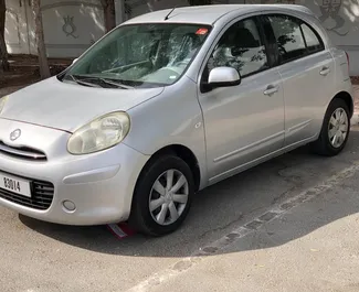Front view of a rental Nissan Micra in Dubai, UAE ✓ Car #4964. ✓ Automatic TM ✓ 0 reviews.