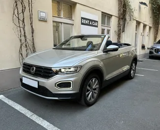 Front view of a rental Volkswagen T-Roc Cabrio in Prague, Czechia ✓ Car #4806. ✓ Automatic TM ✓ 0 reviews.