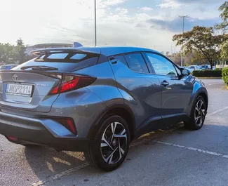 Toyota C-HR 2022 car hire in Greece, featuring ✓ Hybrid fuel and 122 horsepower ➤ Starting from 27 EUR per day.