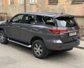 Toyota Fortuner rental. Comfort, SUV Car for Renting in Georgia ✓ Deposit of 1400 GEL ✓ TPL, CDW, SCDW, FDW, Passengers, Theft insurance options.