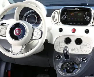 Interior of Fiat 500 Cabrio for hire in Greece. A Great 4-seater car with a Manual transmission.