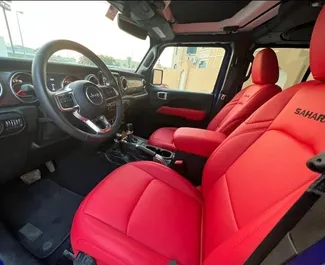 Interior of Jeep Wrangler Sahara for hire in the UAE. A Great 5-seater car with a Automatic transmission.