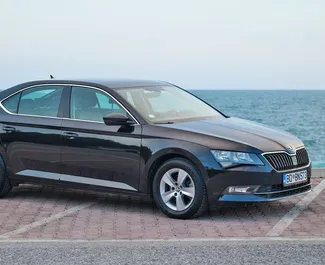 Front view of a rental Skoda Superb in Budva, Montenegro ✓ Car #5906. ✓ Automatic TM ✓ 0 reviews.