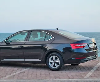 Skoda Superb 2019 car hire in Montenegro, featuring ✓ Diesel fuel and 150 horsepower ➤ Starting from 45 EUR per day.