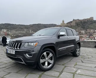 Front view of a rental Jeep Grand Cherokee in Tbilisi, Georgia ✓ Car #5504. ✓ Automatic TM ✓ 1 reviews.