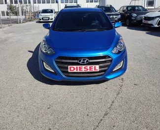 Front view of a rental Hyundai i30 at Thessaloniki Airport, Greece ✓ Car #6018. ✓ Automatic TM ✓ 0 reviews.