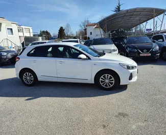 Front view of a rental Hyundai i30 at Thessaloniki Airport, Greece ✓ Car #6034. ✓ Manual TM ✓ 0 reviews.