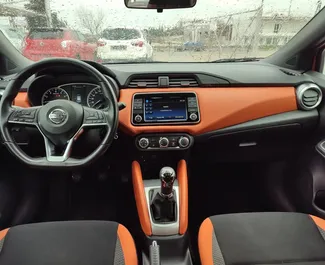 Interior of Nissan Micra for hire in Greece. A Great 5-seater car with a Manual transmission.