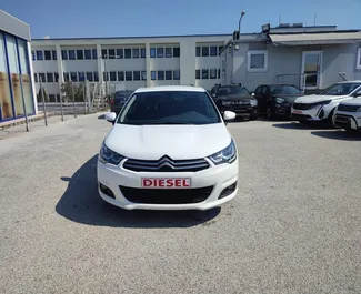 Front view of a rental Citroen C4 at Thessaloniki Airport, Greece ✓ Car #1716. ✓ Automatic TM ✓ 0 reviews.