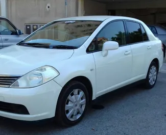 Nissan Tiida 2015 car hire in Cyprus, featuring ✓ Petrol fuel and  horsepower ➤ Starting from 27 EUR per day.