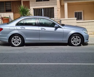 Mercedes-Benz C-Class 2014 available for rent in Limassol, with unlimited mileage limit.