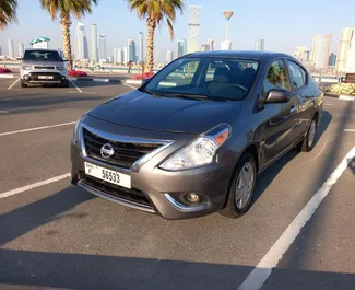 Front view of a rental Nissan Versa in Dubai, UAE ✓ Car #6273. ✓ Automatic TM ✓ 0 reviews.