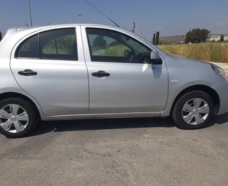 Front view of a rental Nissan March in Larnaca, Cyprus ✓ Car #6509. ✓ Automatic TM ✓ 0 reviews.