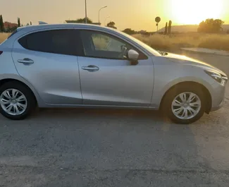 Front view of a rental Mazda Demio in Larnaca, Cyprus ✓ Car #6507. ✓ Automatic TM ✓ 0 reviews.