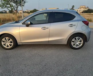 Mazda Demio rental. Economy Car for Renting in Cyprus ✓ Deposit of 600 EUR ✓ TPL, CDW, Theft insurance options.