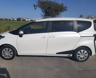Front view of a rental Toyota Sienta in Larnaca, Cyprus ✓ Car #6518. ✓ Automatic TM ✓ 0 reviews.