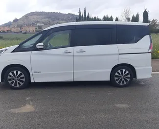 Front view of a rental Nissan Serena in Larnaca, Cyprus ✓ Car #6506. ✓ Automatic TM ✓ 0 reviews.