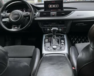 Interior of Audi A6 for hire in Albania. A Great 5-seater car with a Automatic transmission.