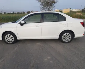 Front view of a rental Toyota Corolla Axio in Larnaca, Cyprus ✓ Car #6516. ✓ Automatic TM ✓ 0 reviews.