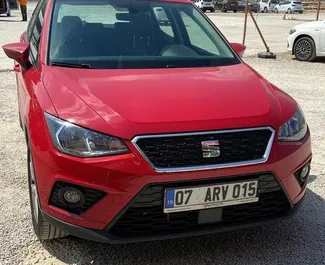 Front view of a rental Seat Arona at Antalya Airport, Turkey ✓ Car #4906. ✓ Automatic TM ✓ 0 reviews.