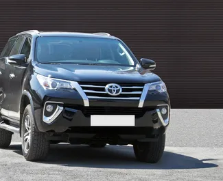 Front view of a rental Toyota Fortuner in Yerevan, Armenia ✓ Car #1177. ✓ Automatic TM ✓ 0 reviews.