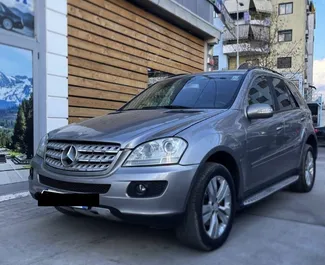 Front view of a rental Mercedes-Benz ML320 in Tirana, Albania ✓ Car #6415. ✓ Automatic TM ✓ 0 reviews.