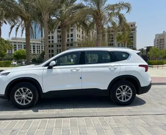 Hyundai Santa Fe 2023 car hire in the UAE, featuring ✓ Petrol fuel and 160 horsepower ➤ Starting from 180 AED per day.