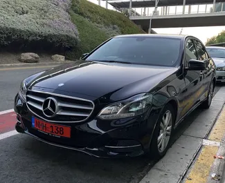 Mercedes-Benz E220 2015 car hire in Cyprus, featuring ✓ Diesel fuel and 170 horsepower ➤ Starting from 48 EUR per day.