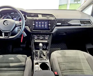 Interior of Volkswagen Touran for hire in Czechia. A Great 7-seater car with a Automatic transmission.
