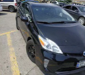 Front view of a rental Toyota Prius in Tbilisi, Georgia ✓ Car #1912. ✓ Automatic TM ✓ 6 reviews.