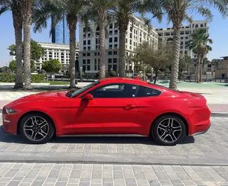 Ford Mustang Coupe 2022 car hire in the UAE, featuring ✓ Petrol fuel and 310 horsepower ➤ Starting from 300 AED per day.