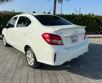 Mitsubishi Attrage – автомобиль категории Эконом напрокат в ОАЭ ✓ Депозит 1500 AED ✓ Страхование: ОСАГО, Супер КАСКО, Пассажиры, От угона.