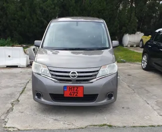Front view of a rental Nissan Serena in Larnaca, Cyprus ✓ Car #3996. ✓ Automatic TM ✓ 0 reviews.