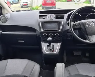 Mazda Premacy rental. Comfort, Minivan Car for Renting in Cyprus ✓ Deposit of 1000 EUR ✓ TPL, CDW, SCDW insurance options.