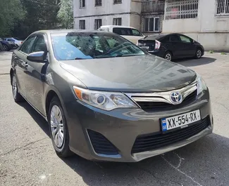 Front view of a rental Toyota Camry in Tbilisi, Georgia ✓ Car #6692. ✓ Automatic TM ✓ 0 reviews.