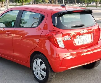Chevrolet Spark 2023 car hire in the UAE, featuring ✓ Petrol fuel and  horsepower ➤ Starting from 95 AED per day.