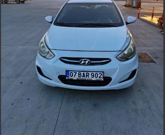 Front view of a rental Hyundai Accent Blue at Antalya Airport, Turkey ✓ Car #7043. ✓ Automatic TM ✓ 3 reviews.