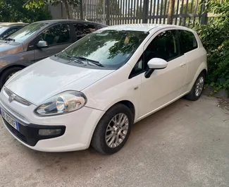 Front view of a rental Fiat Punto in Tirana, Albania ✓ Car #7168. ✓ Manual TM ✓ 1 reviews.