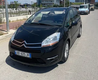 Front view of a rental Citroen C4 Grand Picasso in Tirana, Albania ✓ Car #7048. ✓ Automatic TM ✓ 0 reviews.