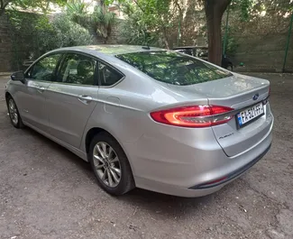 Ford Fusion Sedan 2017 available for rent at Tbilisi Airport, with unlimited mileage limit.