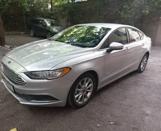 Ford Fusion Sedan 2017 car hire in Georgia, featuring ✓ Hybrid fuel and 188 horsepower ➤ Starting from 128 GEL per day.