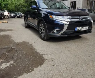 Front view of a rental Mitsubishi Outlander Xl in Tbilisi, Georgia ✓ Car #7325. ✓ Automatic TM ✓ 1 reviews.